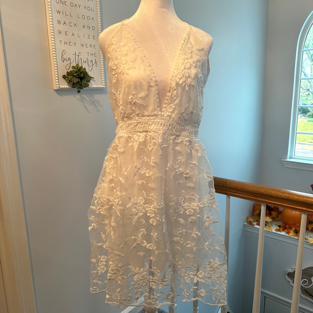 Off-white embroidered feminine dress